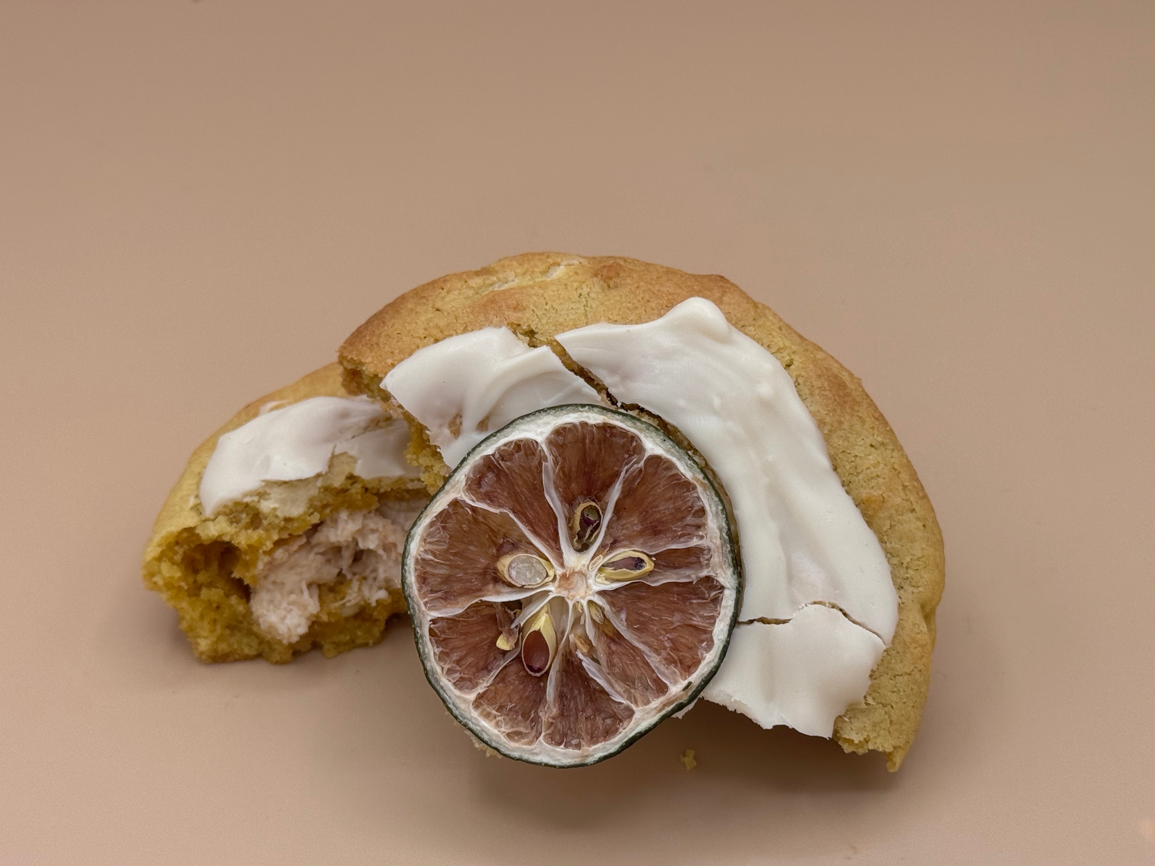 Silk Citron cookie pulled apart revealing silky mint white chocolate kunafa center — Dubai House limited drop