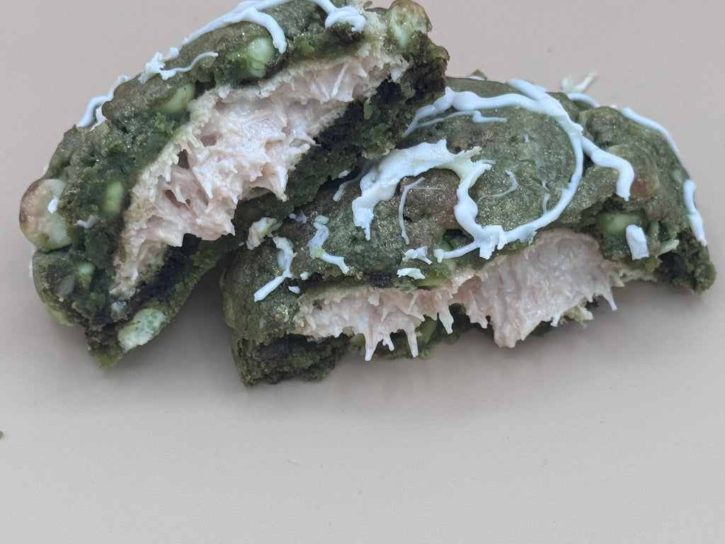 Close-up of Jade Eclipse cookie filling — silky white chocolate kunafa center with green matcha dough — handcrafted Dubai House cookie